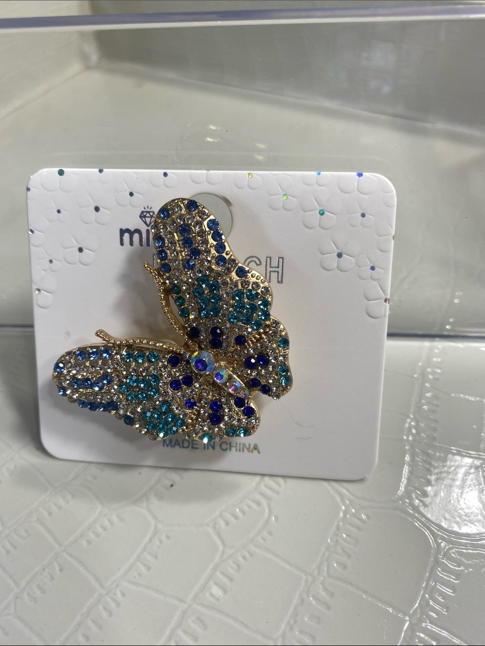 Mi Gold Butterfly brooch with Blue and Teal Crystals